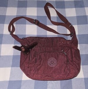 Kipling Burgundy Crossbody Bag with Monkey Keychain